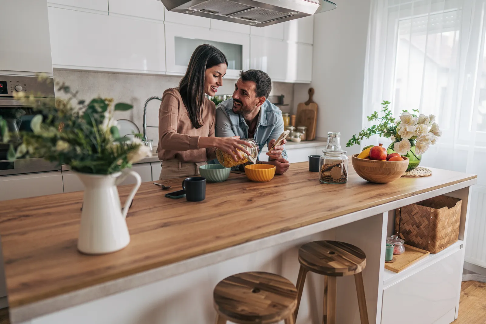 Bright kitchen counter with fresh ingredients for home cooking